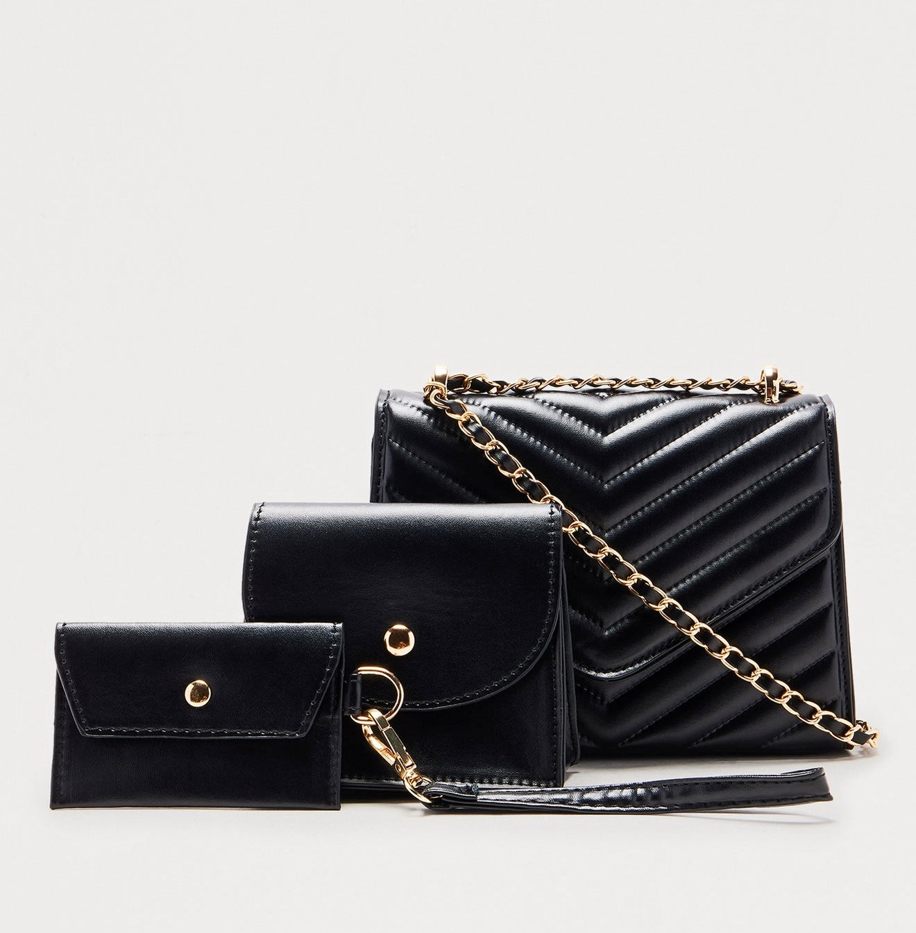 Sac à main effet croco noir avec chaîne dorée